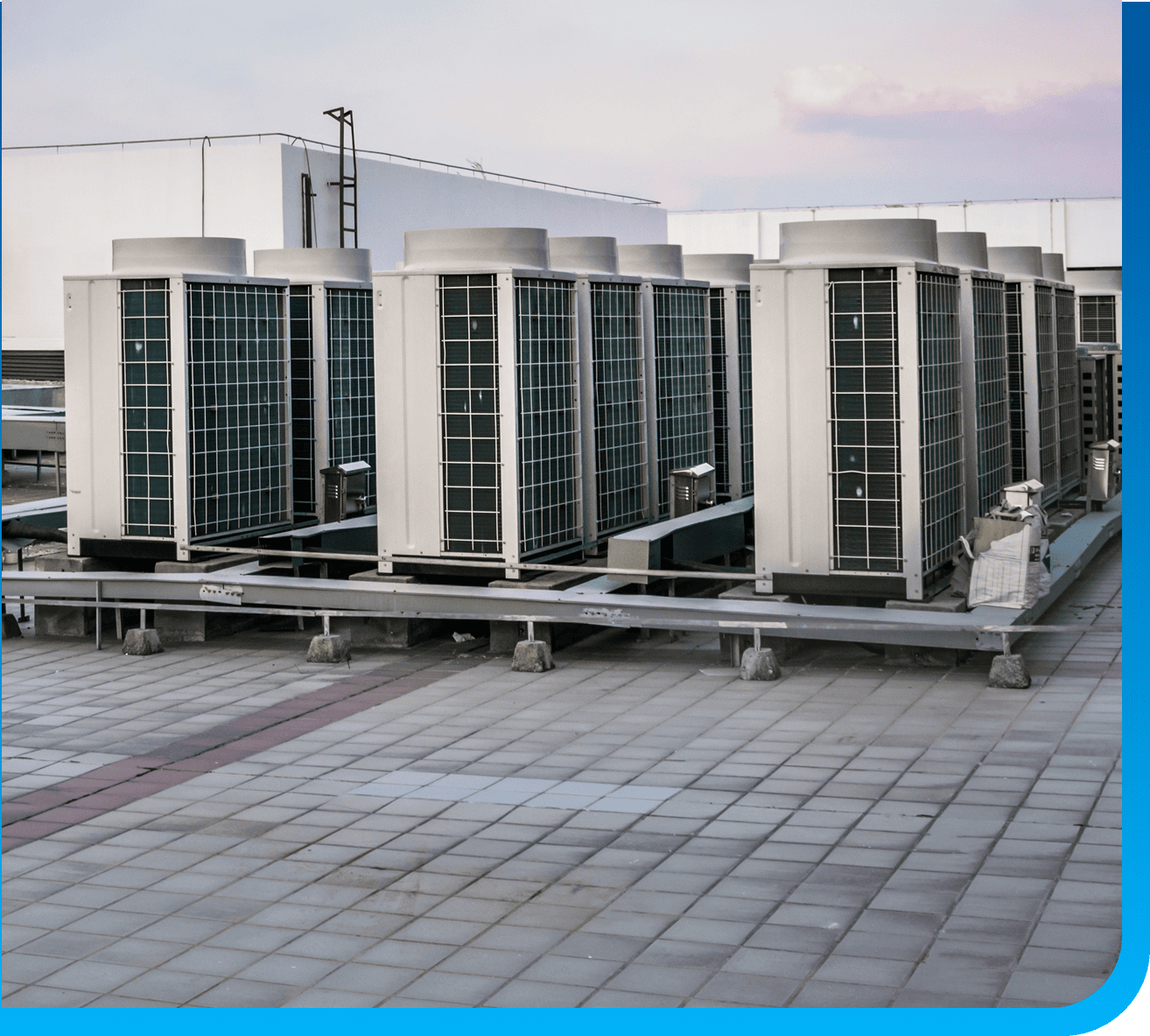 industralcommerical-full Air conditioner condenser units on rooftop of commercial business in Joplin, MO.